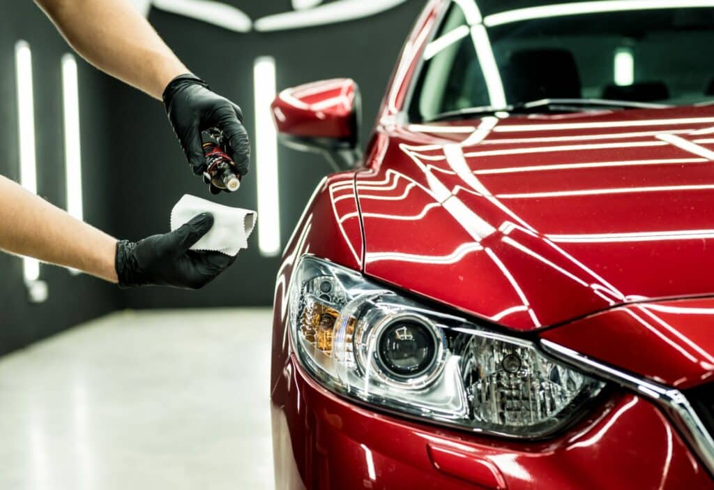 Close-up of a car in Birmingham with a professionally applied ceramic coating, showcasing its long-lasting shine and protection against environmental elements.jpeg